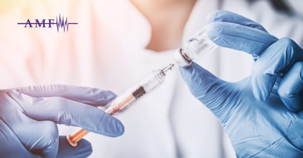 doctor filling syringe with Onabotulinum A